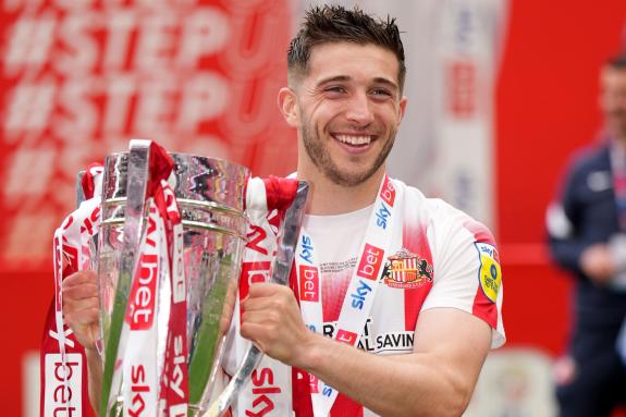 We Are Sunderland: Lynden Gooch celebrates with the Sky Bet League One Play-Off trophy. We Are Sunderland: Lynden Gooch celebrates with the Sky Bet League One Play-Off trophy.