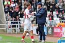 Mike Dodds embraces Jack Clarke after he's substituted in Sunderland's defeat to Sheffield Wednesday.