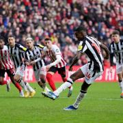 Alexander Isak slots home Newcastle United's third goal from the penalty spot