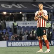 Dan Ballard is to serve a two-match suspension after picking up his tenth yellow card of the season in Sunderland's defeat at Birmingham City